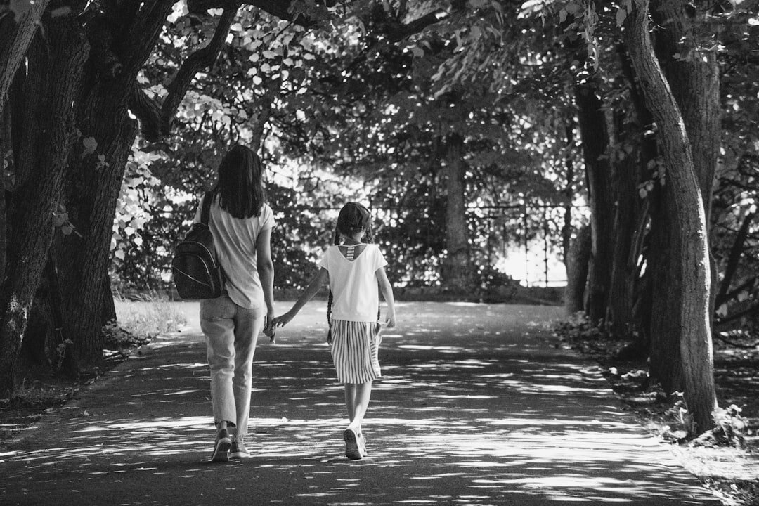 celebrity couple walking in park