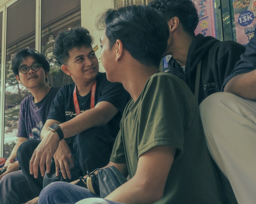 group of friends talking intimately